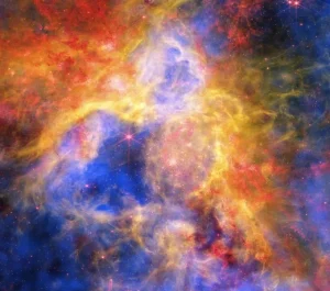 Imagen compuesta de la nebulosa de la Tarántula con observaciones de los telescopios Chandra, Webb y Hubble
